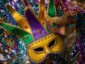 Mardi Gras mask and beads